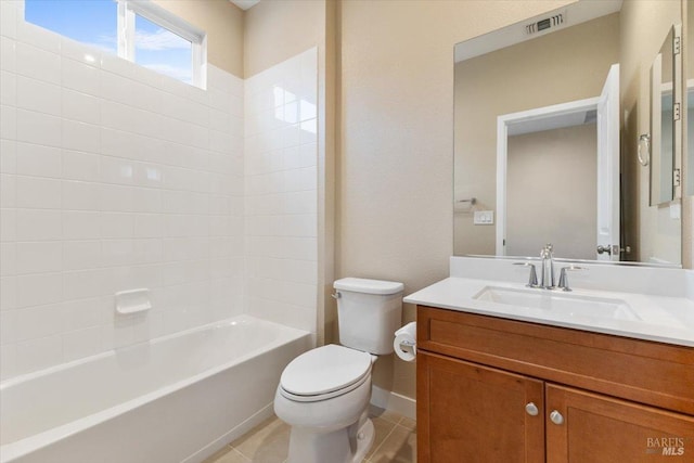 bathroom with visible vents, toilet, vanity, tub / shower combination, and baseboards