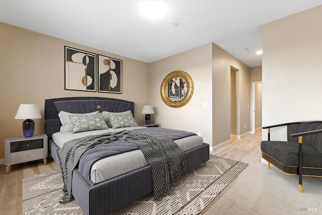bedroom featuring recessed lighting, baseboards, and carpet