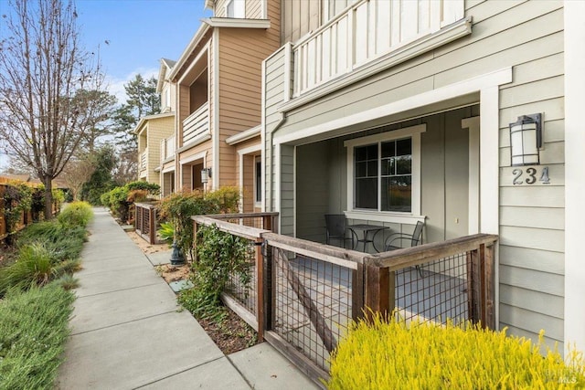 view of home's exterior featuring board and batten siding and a porch