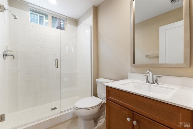 full bathroom featuring visible vents, toilet, a stall shower, and vanity