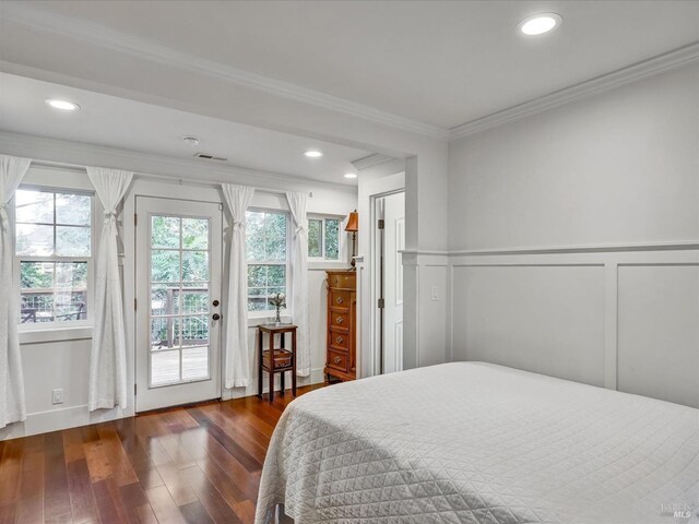 bedroom featuring access to exterior, ornamental molding, and dark hardwood / wood-style floors