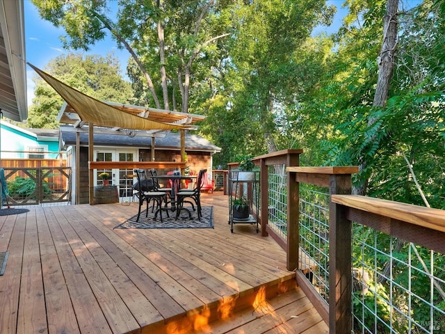 deck featuring outdoor dining space