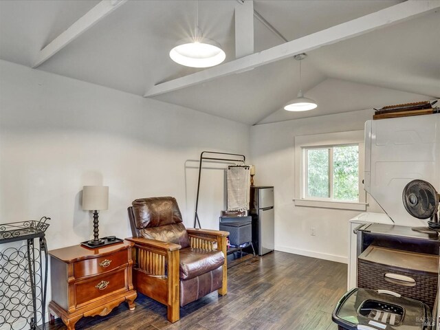 interior space with dark hardwood / wood-style floors and lofted ceiling with beams