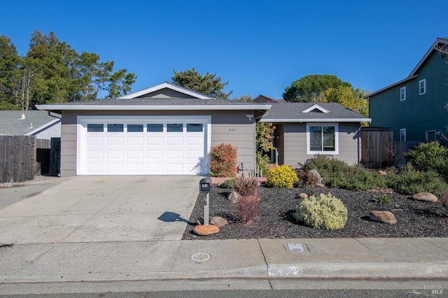 ranch-style house featuring a garage