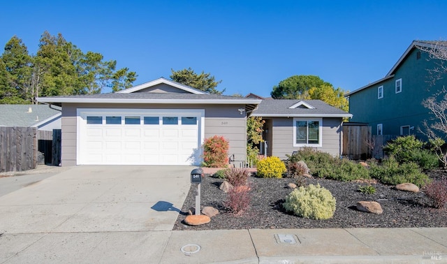 ranch-style house featuring a garage