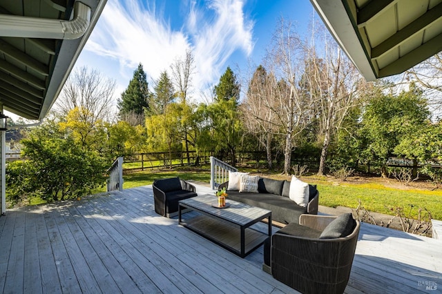 wooden deck featuring an outdoor living space