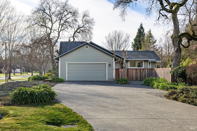 ranch-style home with a garage