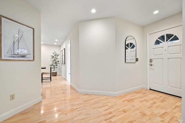 foyer entrance featuring light wood-type flooring