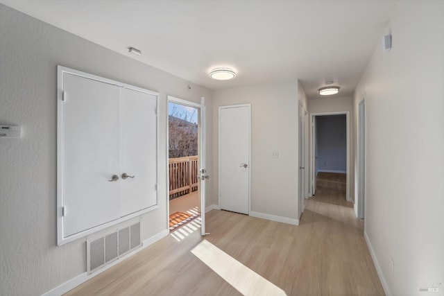 entrance foyer with light hardwood / wood-style flooring