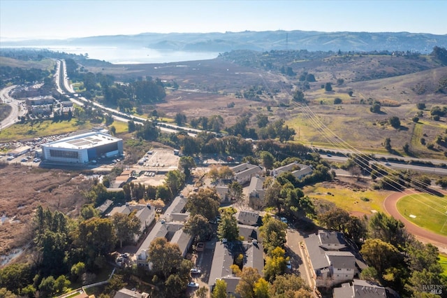 drone / aerial view featuring a mountain view