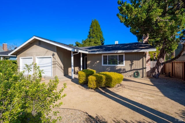 ranch-style home with a garage