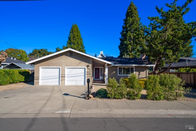 single story home with a garage