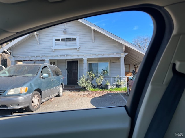 view of front of home featuring covered porch