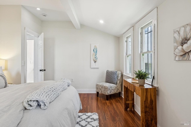 bedroom with dark hardwood / wood-style flooring and vaulted ceiling with beams