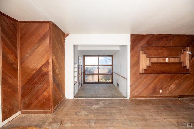 interior space featuring wood walls