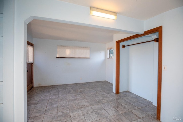 unfurnished bedroom featuring a closet