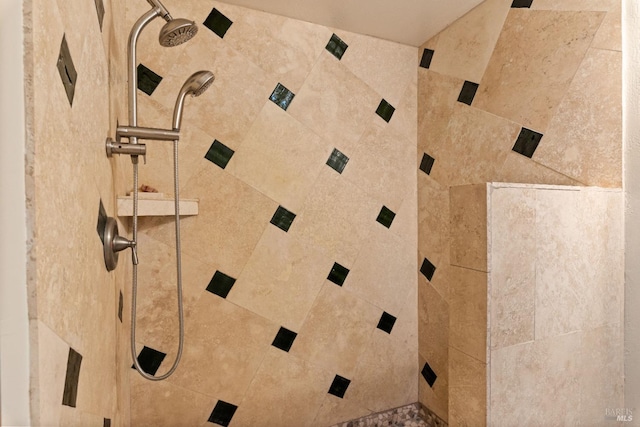 interior details with a tile shower