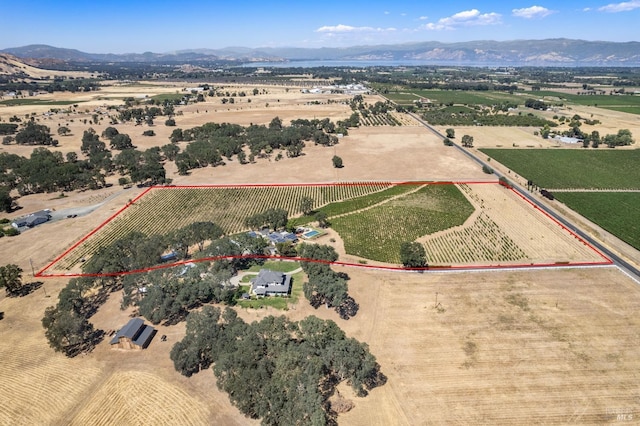 bird's eye view with a rural view and a mountain view