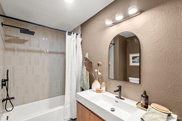 bathroom with vanity and shower / bath combination with curtain