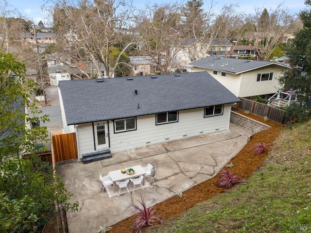 rear view of property featuring a patio