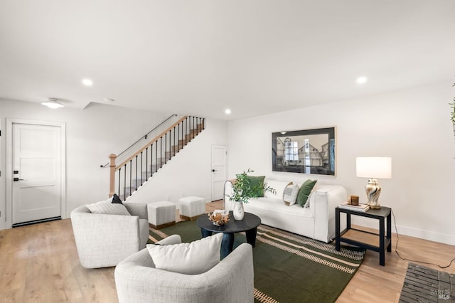 living room with light hardwood / wood-style floors