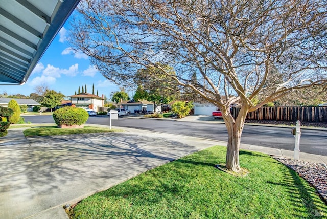 view of yard with a garage