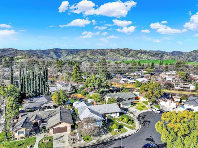 bird's eye view featuring a residential view and a mountain view