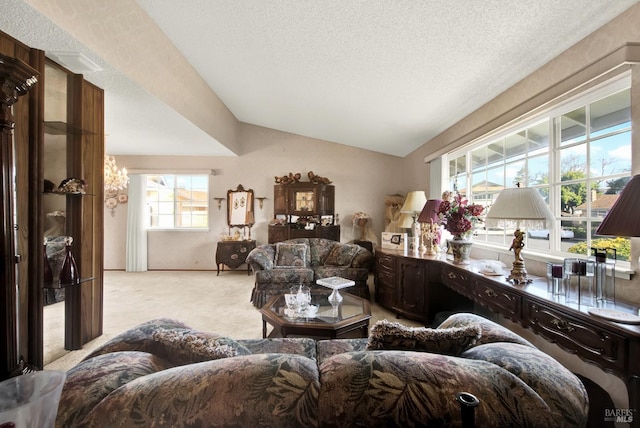 living room featuring a textured ceiling, light carpet, and lofted ceiling