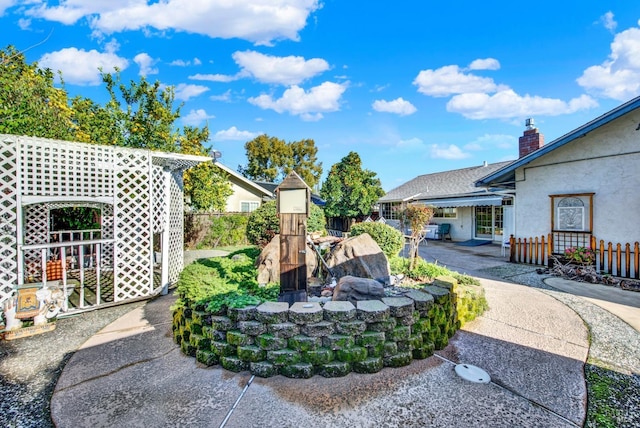 view of yard with a patio area and fence