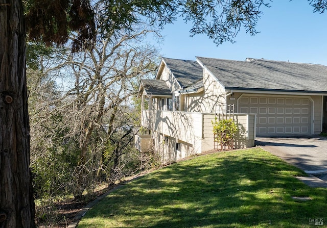 view of property exterior featuring a yard