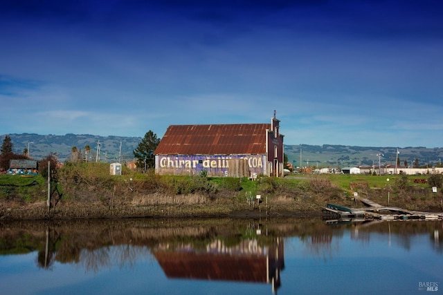 property view of water featuring a mountain view