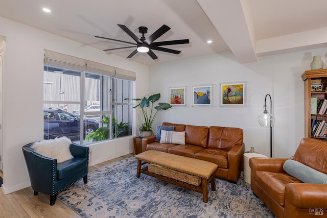 living area featuring baseboards, a ceiling fan, wood finished floors, and recessed lighting