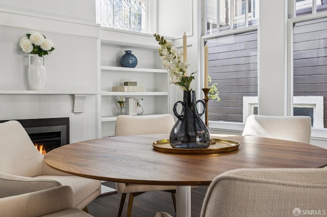 dining space featuring built in features