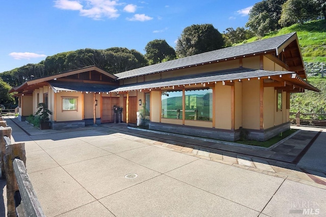 view of front of property with a patio