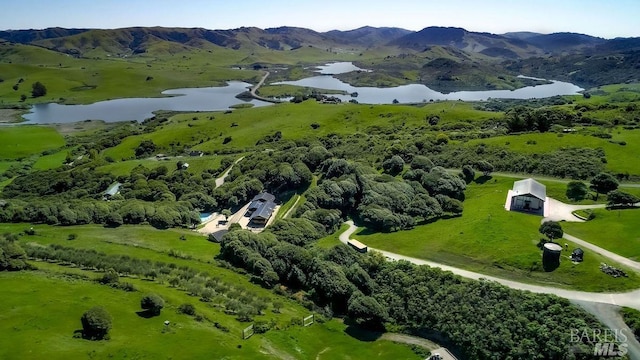 bird's eye view featuring a water and mountain view