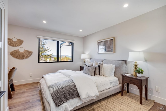 bedroom featuring light hardwood / wood-style flooring