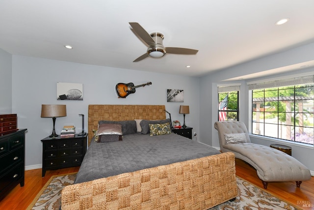 bedroom with recessed lighting, baseboards, ceiling fan, and wood finished floors