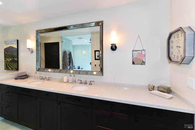 bathroom featuring vanity and a shower stall