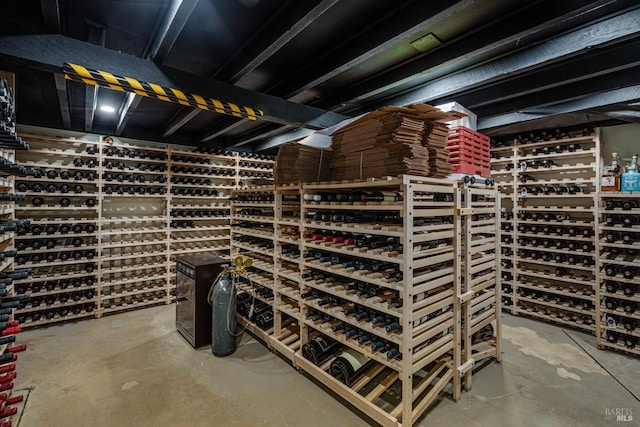 wine cellar featuring concrete floors