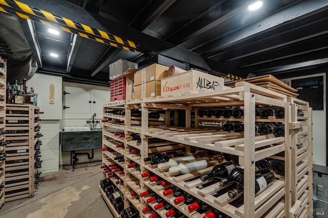 wine cellar featuring concrete flooring