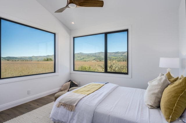 1212 Oak Knoll Ave, Napa, CA 94558 - bedroom with multiple windows, wood finished floors, lofted ceiling, a mountain view, and baseboards