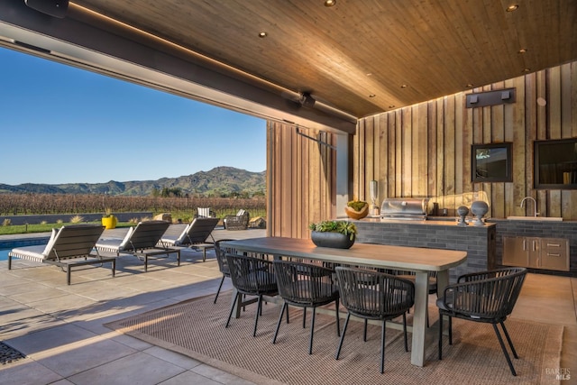 1212 Oak Knoll Ave, Napa, CA 94558 - view of patio / terrace with a mountain view and outdoor dining area