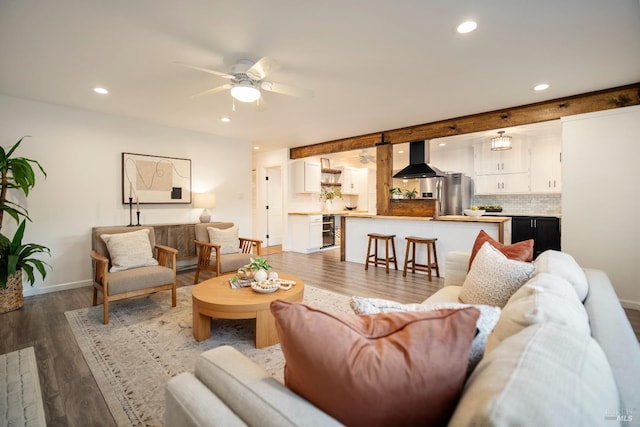 living room featuring wine cooler, hardwood / wood-style flooring, and ceiling fan