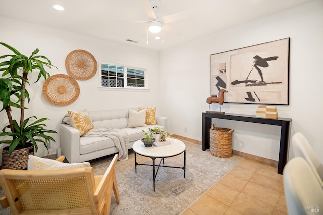 tiled living room featuring ceiling fan