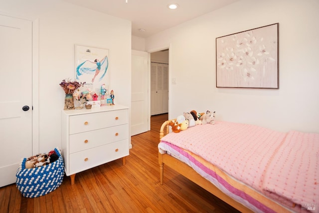 bedroom with light hardwood / wood-style flooring