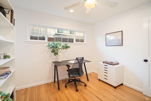 office area with ceiling fan and light wood-type flooring