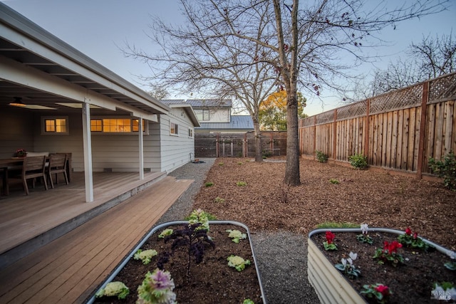 view of yard featuring a wooden deck