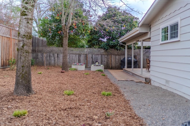 view of yard featuring a deck