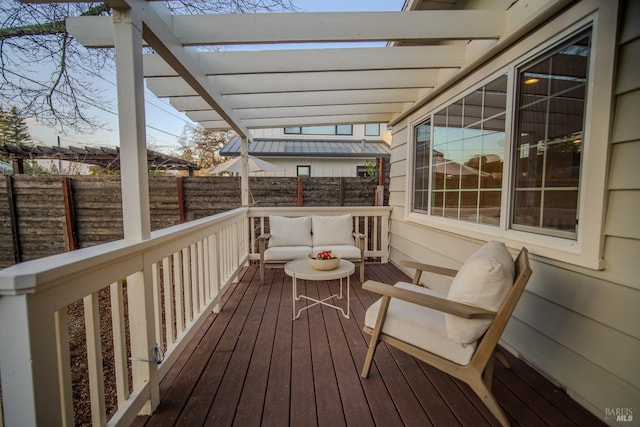 wooden deck featuring an outdoor hangout area