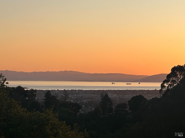 mountain view featuring a water view